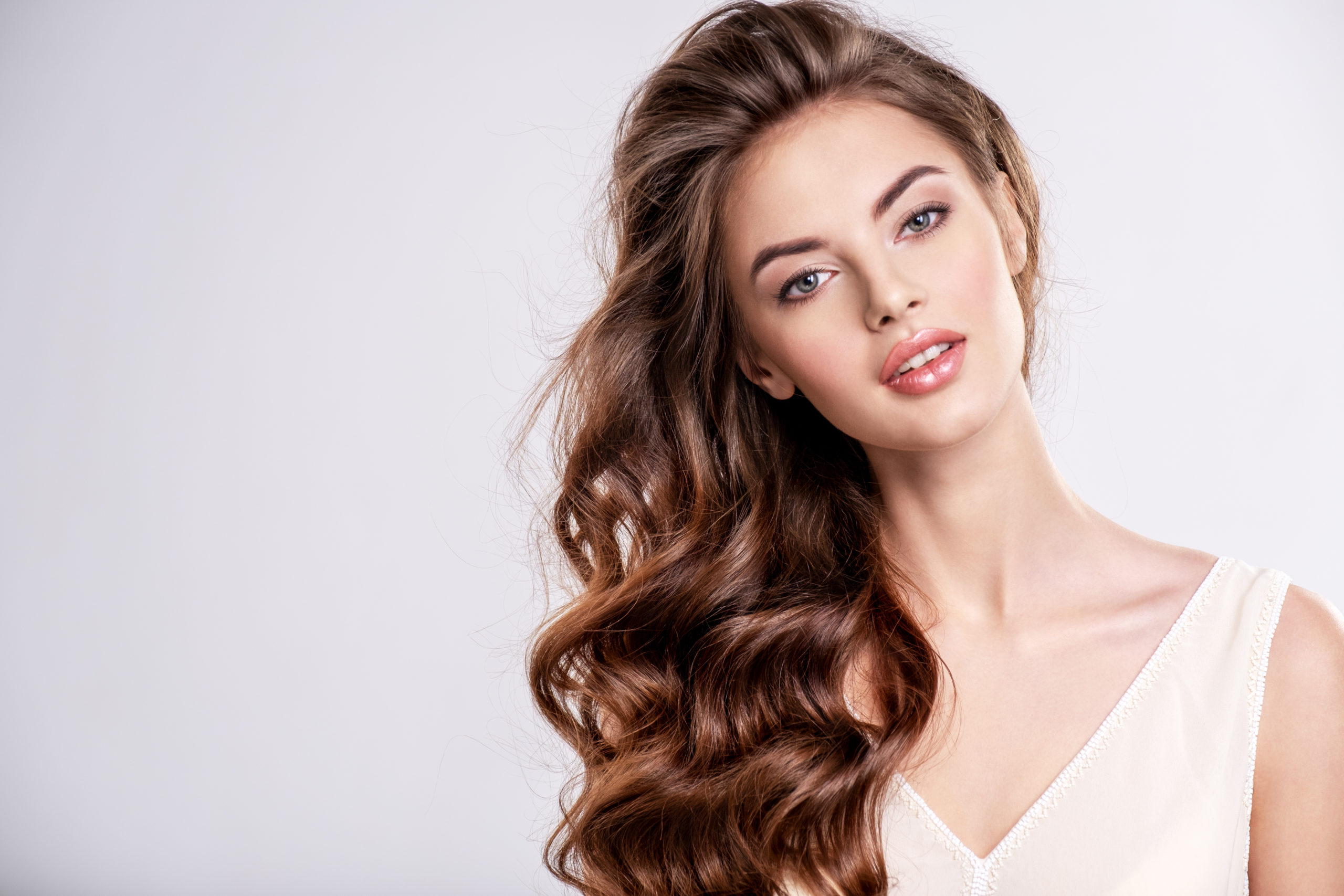 Beautiful lady with a cute face and long hair | Get PDO Thread lift in Northwest Beauty and Wellness at Sequim, WA